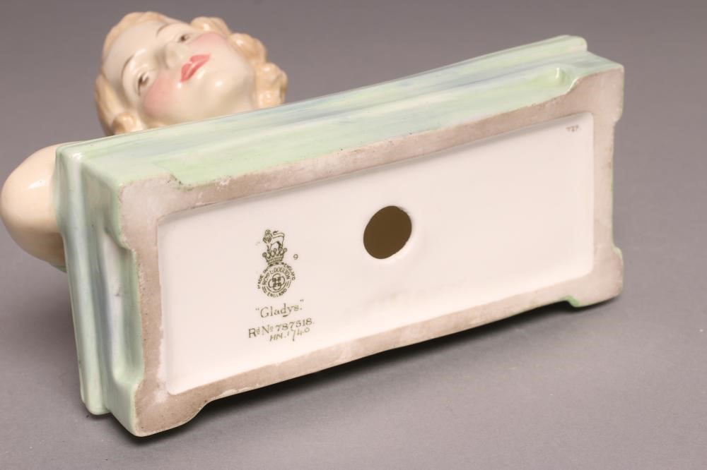 GLADYS - A ROYAL DOULTON CHINA BUST, HN1740, inscribed and printed marks in green, 4 3/4" high (Est. Image