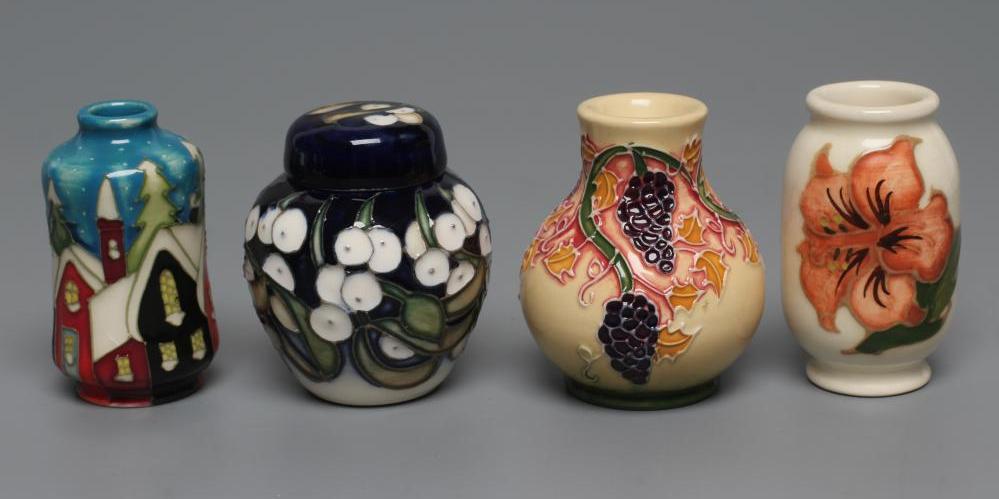 A COLLECTION OF THREE MINIATURE MOORCROFT POTTERY VASES Image