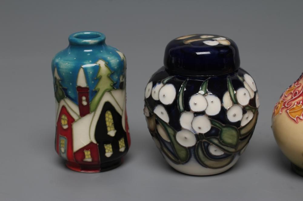 A COLLECTION OF THREE MINIATURE MOORCROFT POTTERY VASES Image