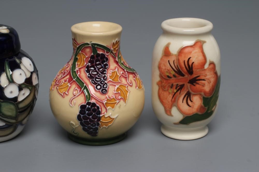 A COLLECTION OF THREE MINIATURE MOORCROFT POTTERY VASES Image