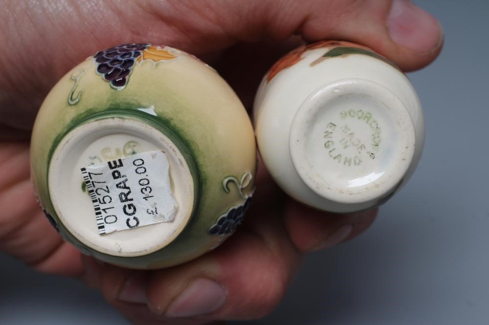 A COLLECTION OF THREE MINIATURE MOORCROFT POTTERY VASES Image