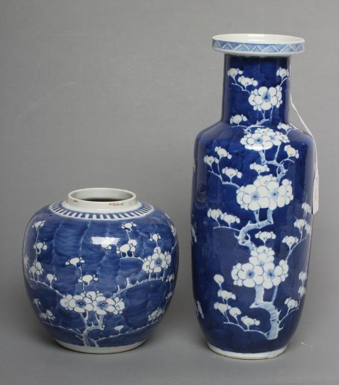 A CHINESE PORCELAIN ROULEAU VASE painted in underglaze blue with the Cracked Ice and Prunus pattern Image
