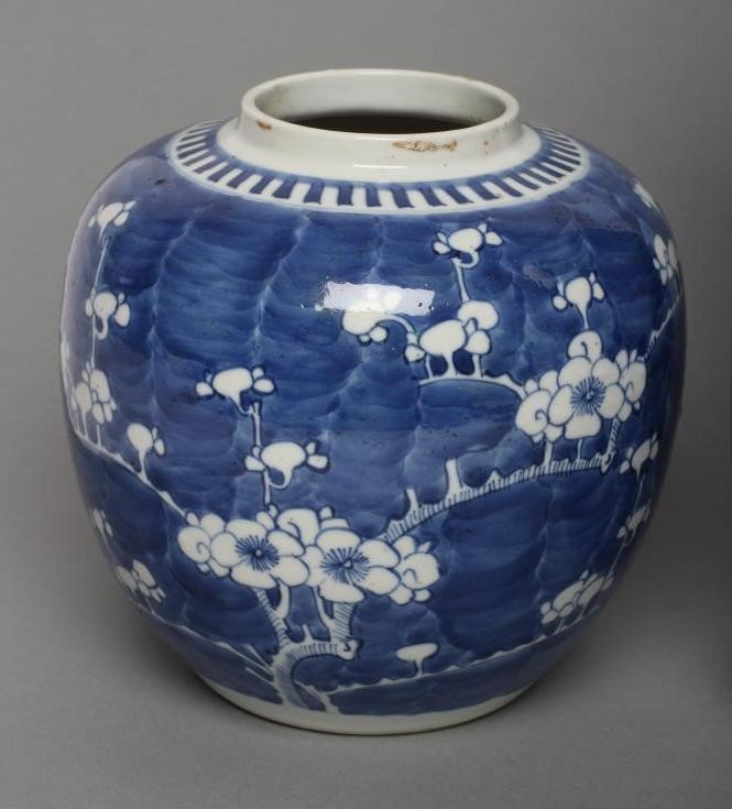 A CHINESE PORCELAIN ROULEAU VASE painted in underglaze blue with the Cracked Ice and Prunus pattern Image