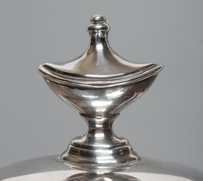 AN EPNS SOUP TUREEN AND COVER, early 20th century, of oval form with reeded loop handles on a swept Image