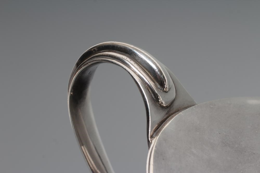 AN EPNS SOUP TUREEN AND COVER, early 20th century, of oval form with reeded loop handles on a swept Image