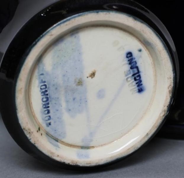 A PAIR OF MOORCROFT POTTERY POMEGRANATE PATTERN VASES Image