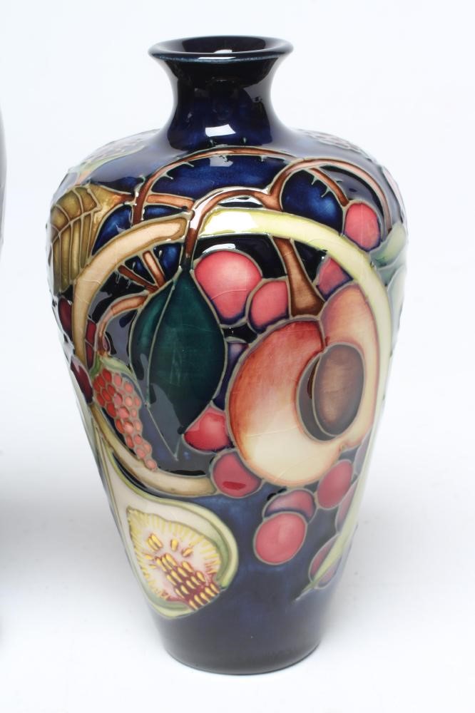 A MOORCROFT POTTERY PANSY PATTERN VASE Image