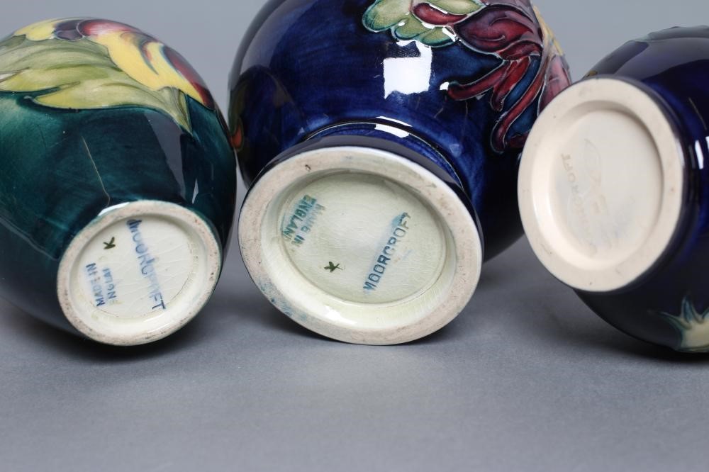 THREE MOORCROFT POTTERY SMALL VASES Image