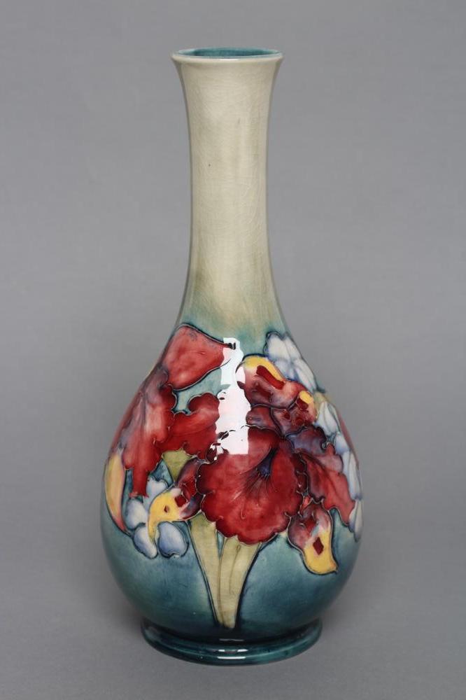 A MOORCROFT POTTERY IRIS PATTERN BOTTLE VASE Image