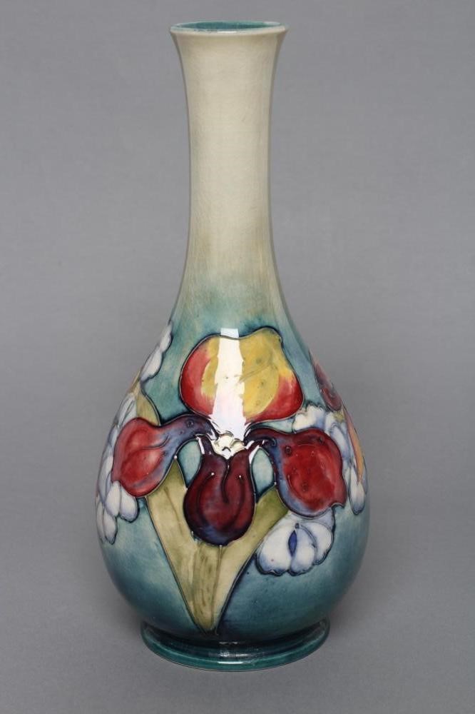 A MOORCROFT POTTERY IRIS PATTERN BOTTLE VASE Image