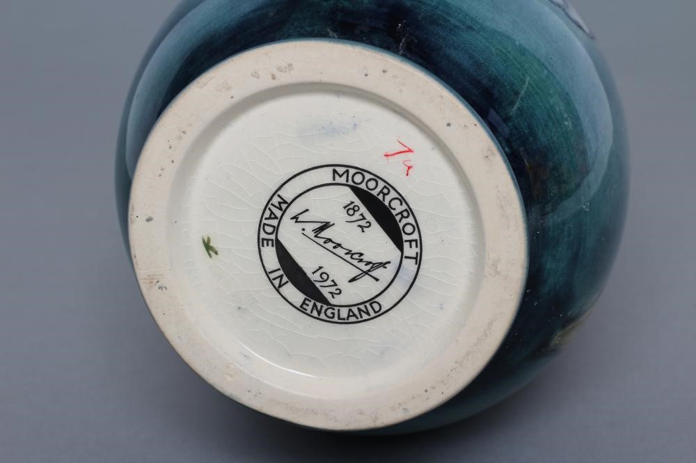 A MOORCROFT POTTERY IRIS PATTERN BOTTLE VASE Image