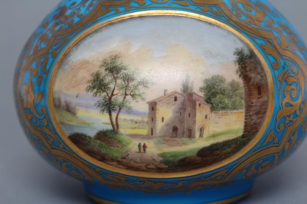 A TURQUOISE OVERLAY WHITE OPAQUE GLASS BOTTLE VASE Image