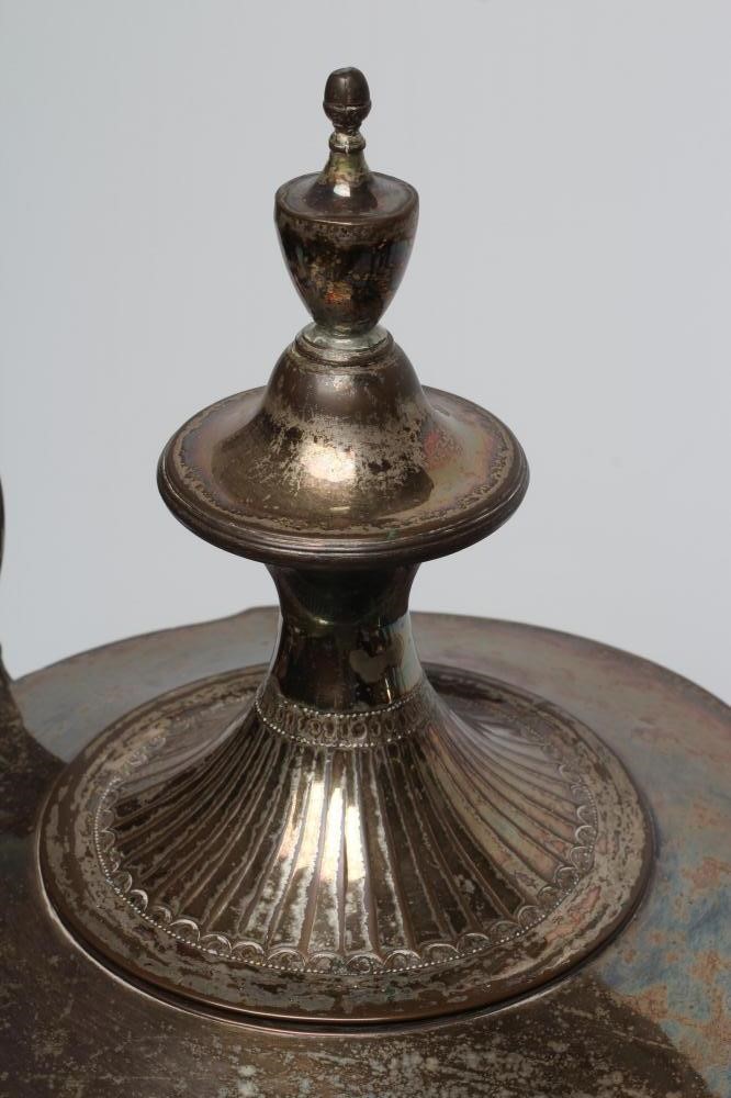 A REGENCY PLATED ON COPPER TEA URN with swept lift-off cover Image