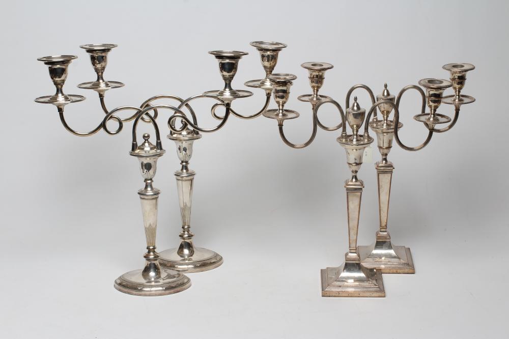 A PAIR OF EDWARDIAN PLATED ON COPPER TWO BRANCH CANDELABRA Image