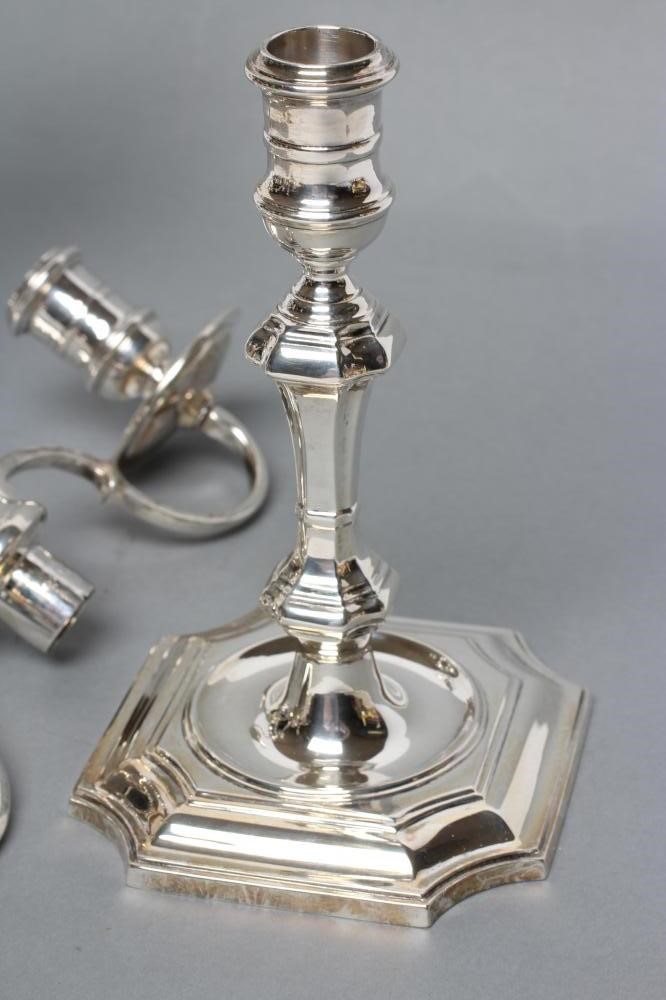A PAIR OF GEORGE I STYLE SILVER TWO BRANCH CANDELABRA Image