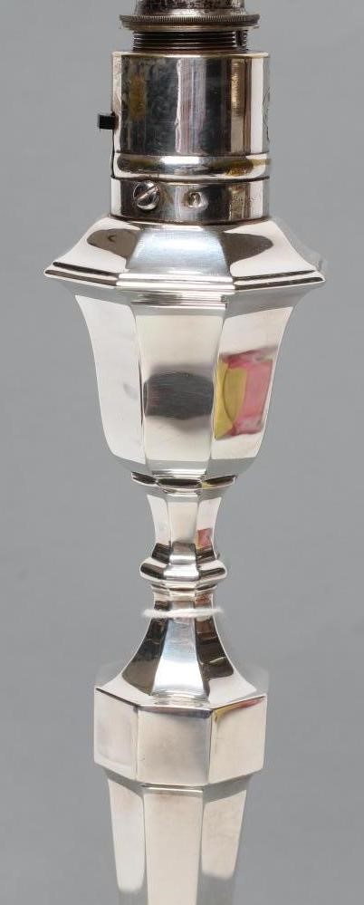 A SILVER ELECTRIC TABLE LAMP BASE Image