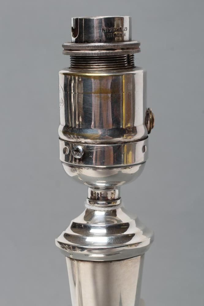 A SILVER ELECTRIC TABLE LAMP BASE Image