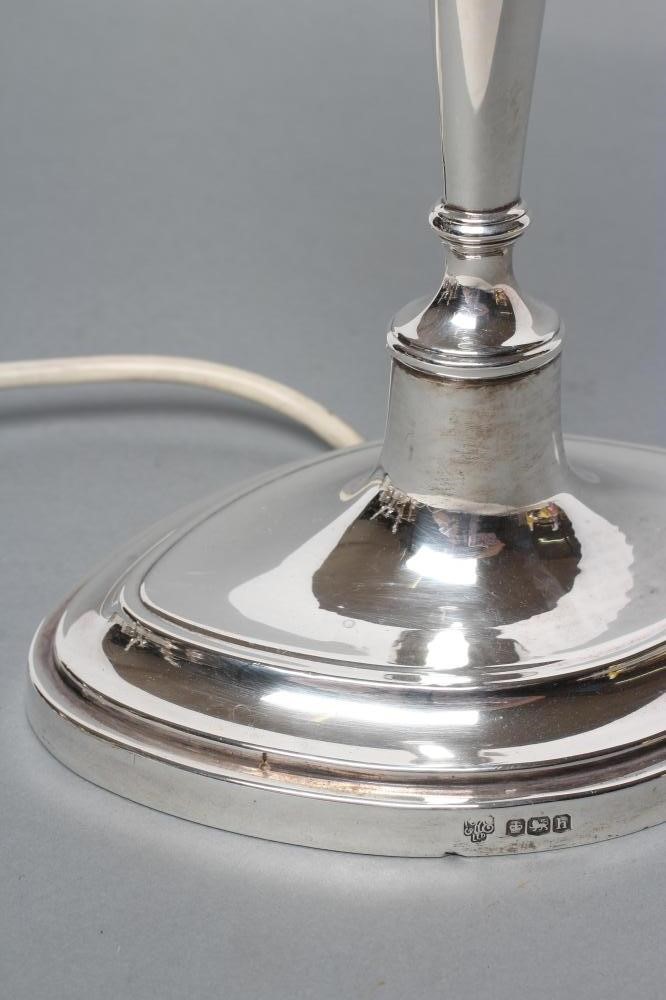 A SILVER ELECTRIC TABLE LAMP BASE Image