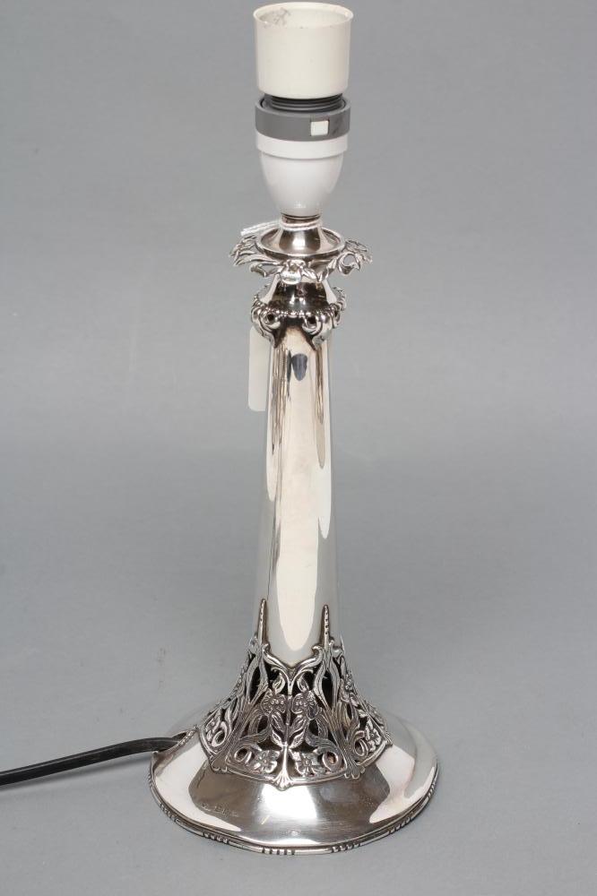 A SILVER ELECTRIC TABLE LAMP BASE Image