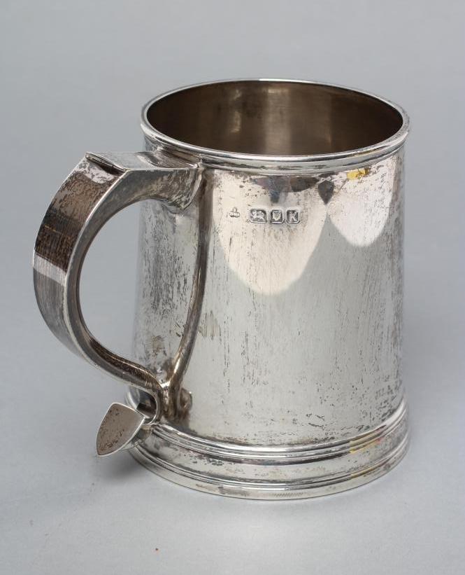 A SILVER MUG Image