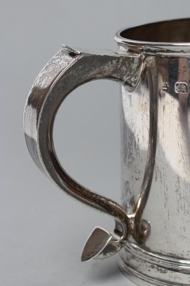 A SILVER MUG Image