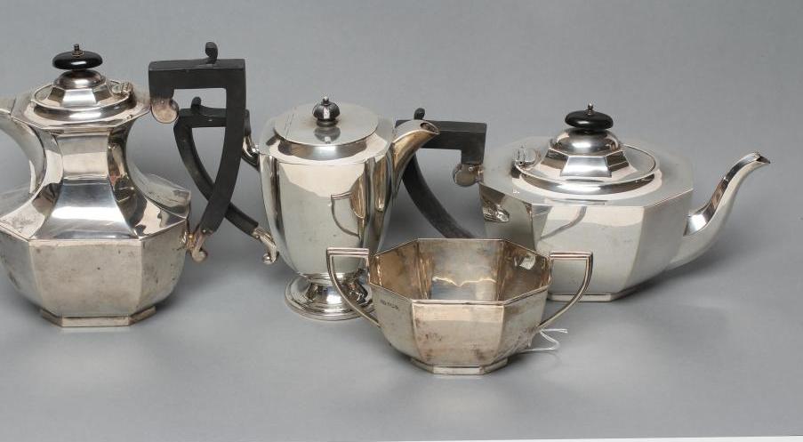A SILVER THREE PIECE TEA SERVICE Image