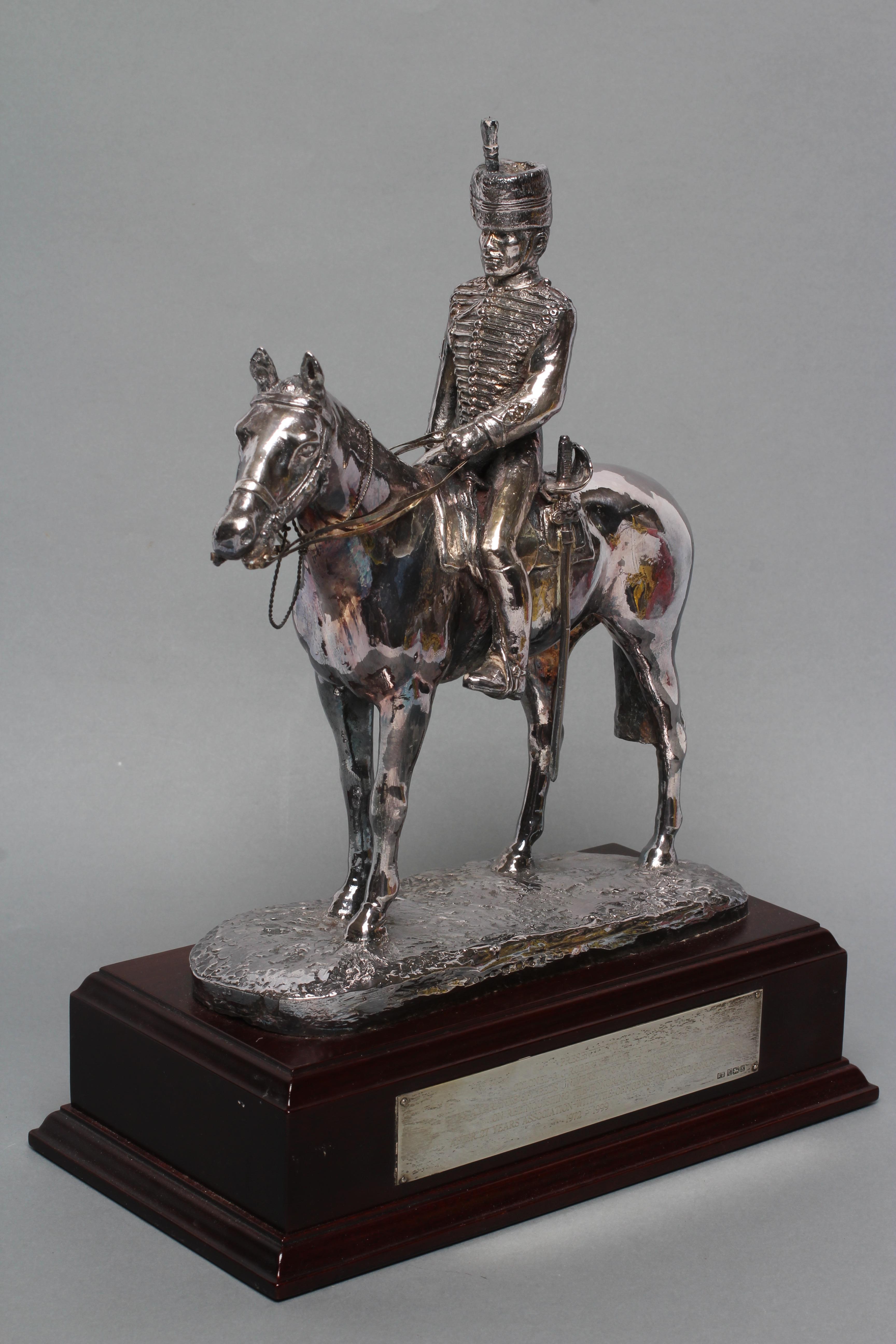 A FILLED SILVER EQUESTRIAN MODEL Image