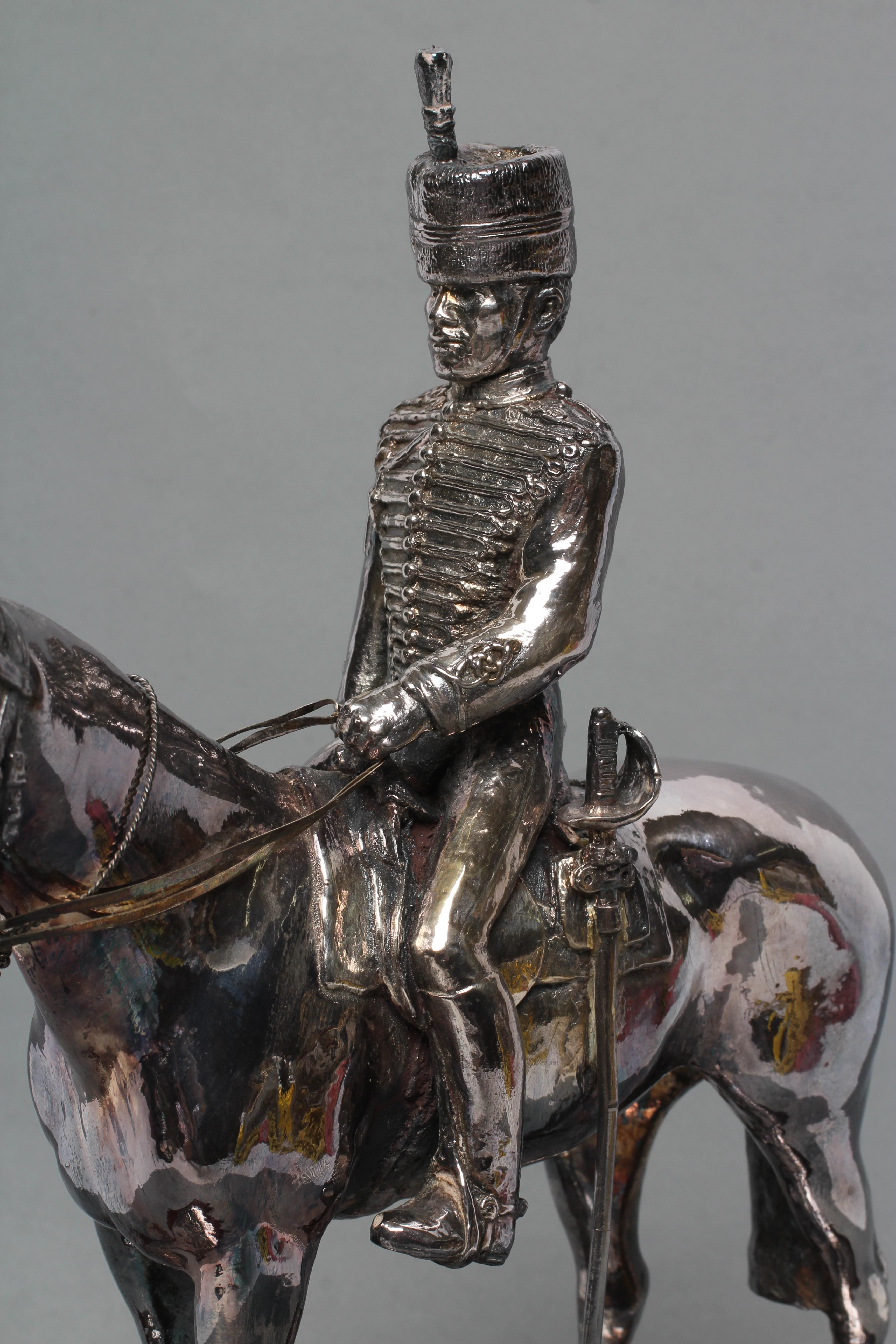 A FILLED SILVER EQUESTRIAN MODEL Image