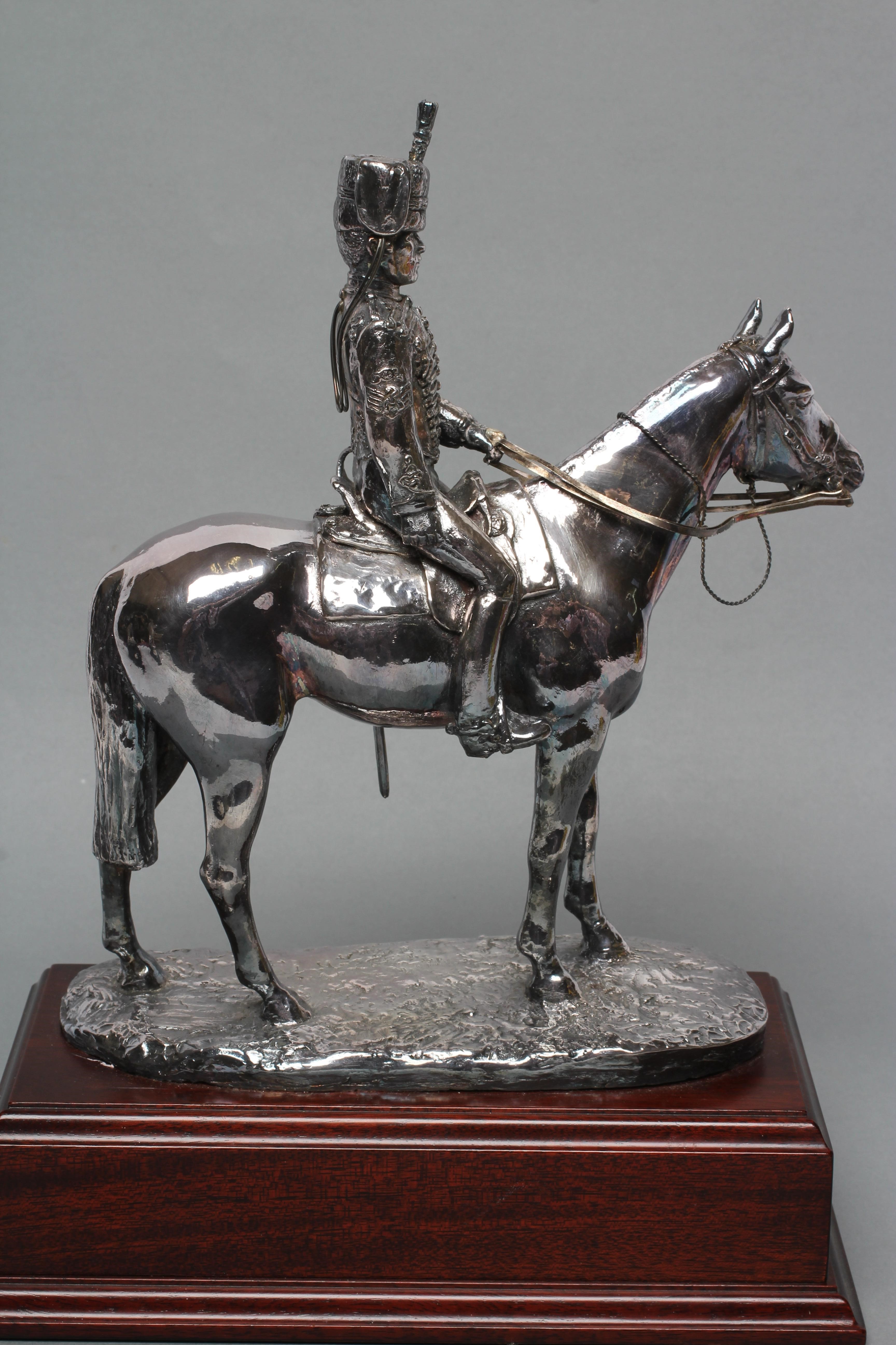 A FILLED SILVER EQUESTRIAN MODEL Image
