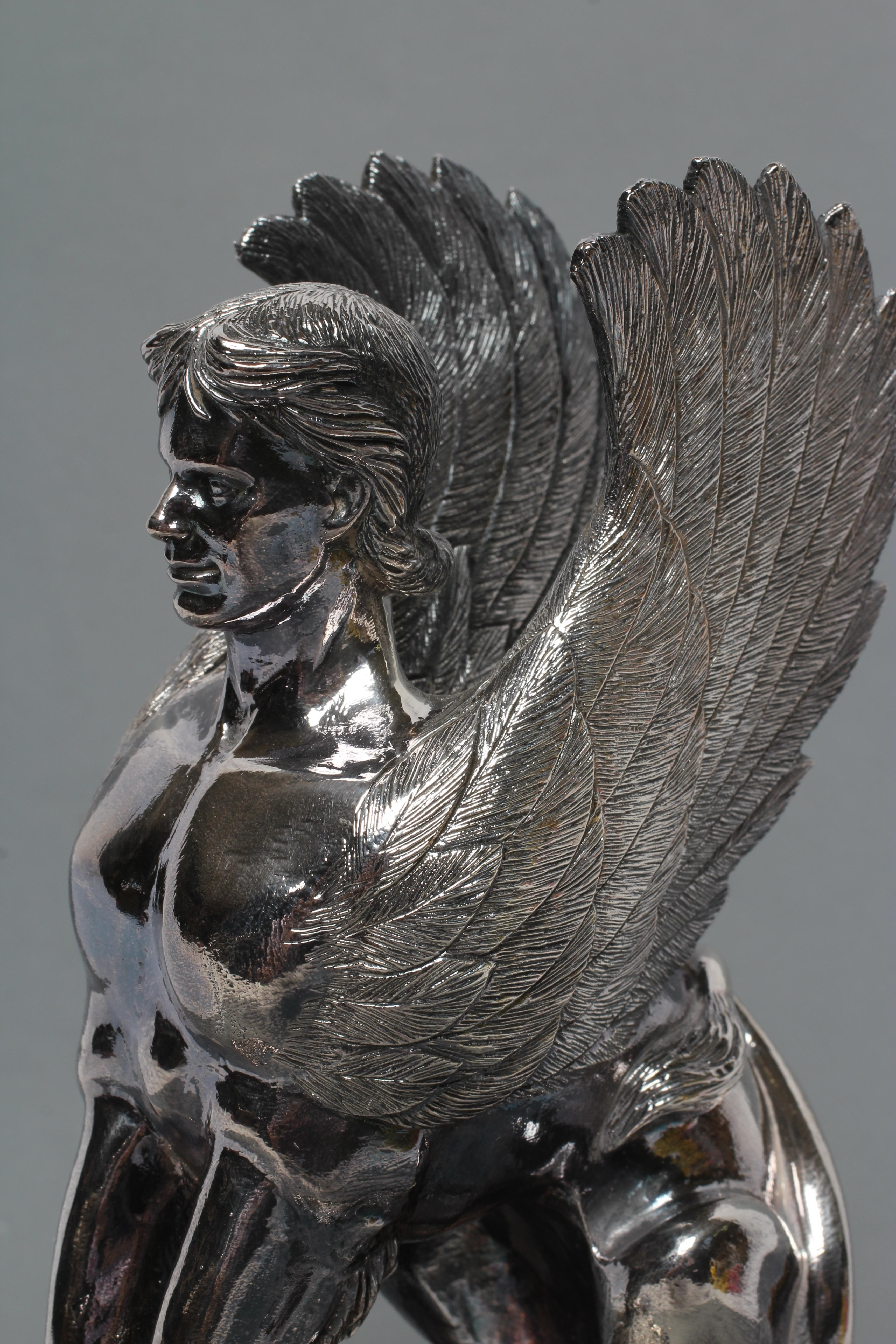 A FILLED SILVER MODEL OF THE SPHINX Image