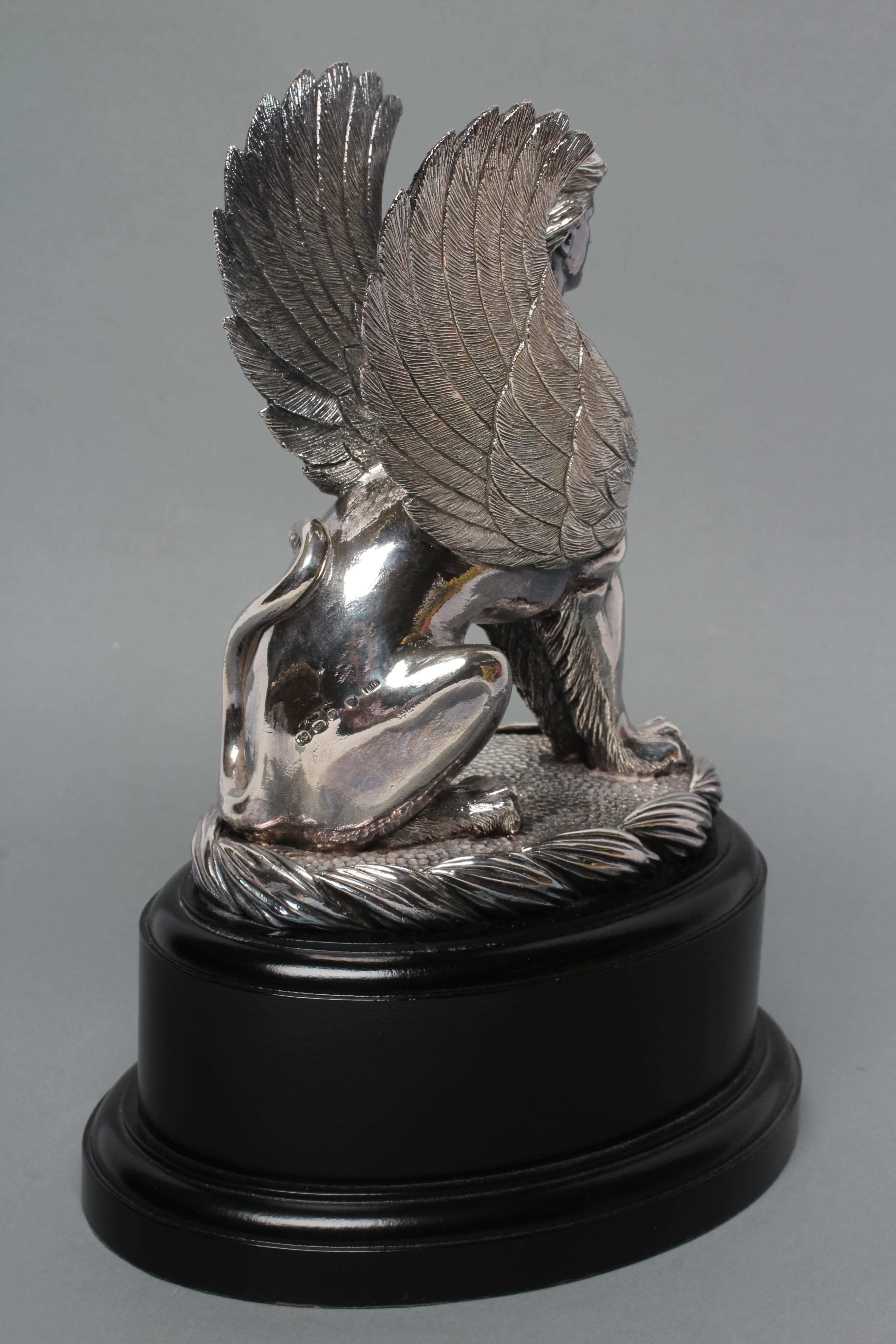 A FILLED SILVER MODEL OF THE SPHINX Image