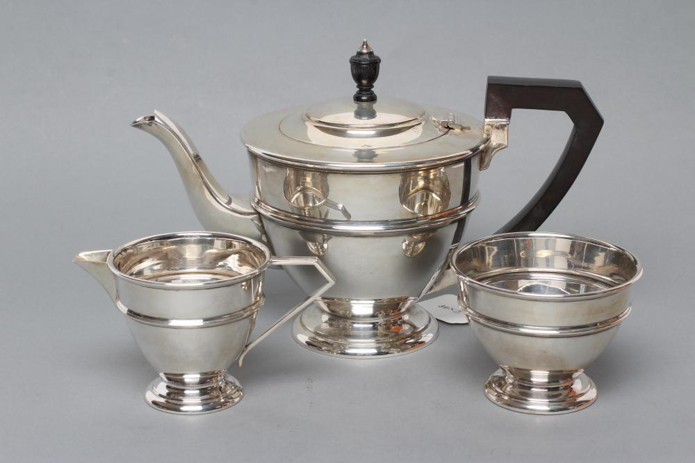 AN ART DECO SILVER THREE PIECE TEA SERVICE Image