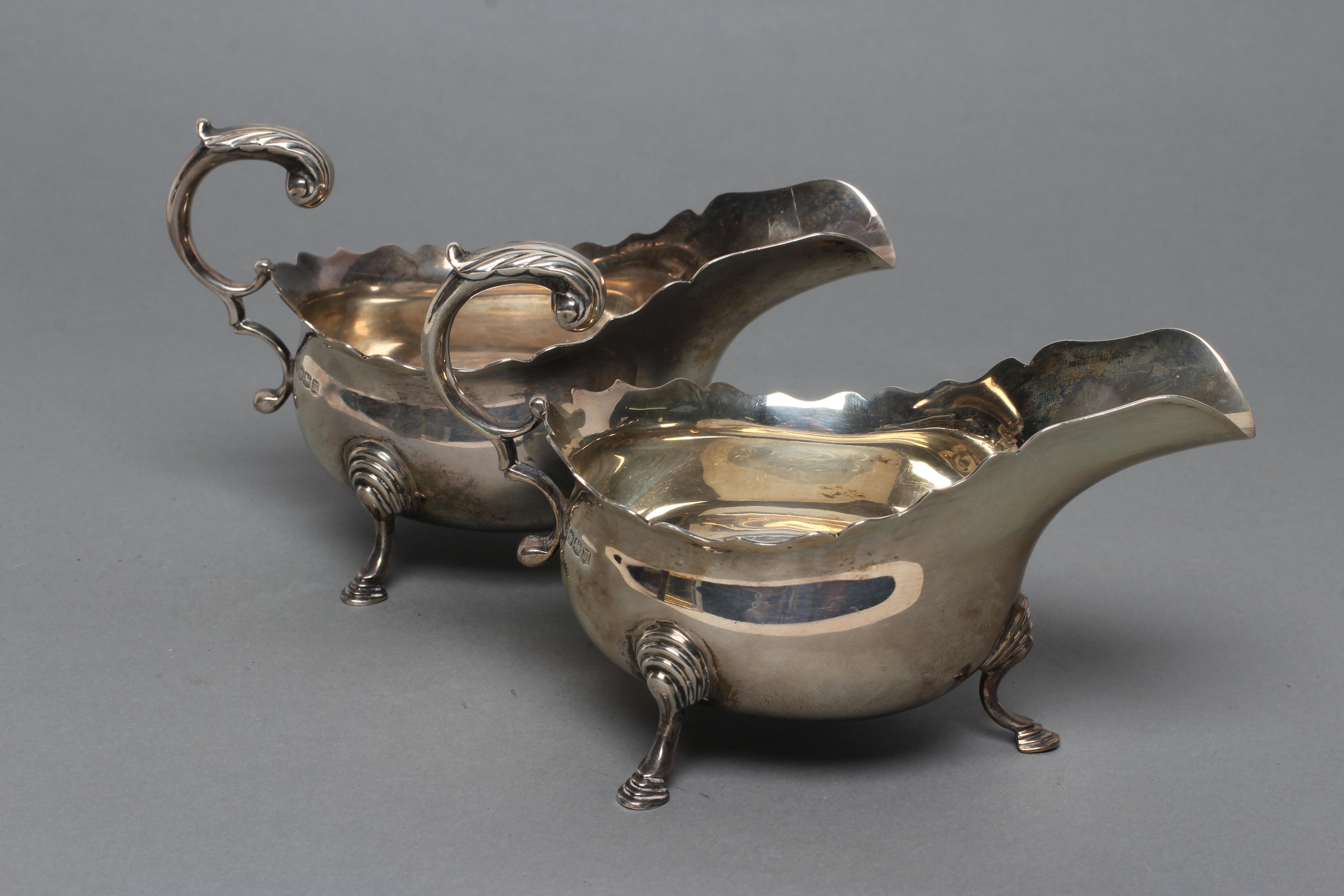 A PAIR OF SILVER SAUCEBOATS Image