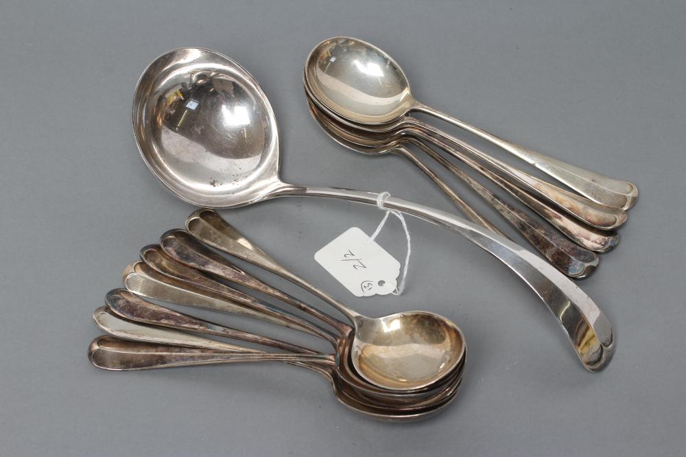 A SET OF TWELVE SILVER RAT-TAIL PATTERN SOUP SPOONS Image