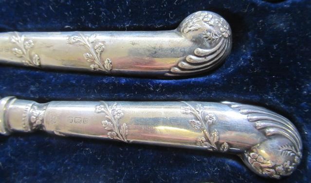 AN EDWARDIAN SET OF SIX PAIRS OF SILVER DESSERT KNIVES AND FORKS Image