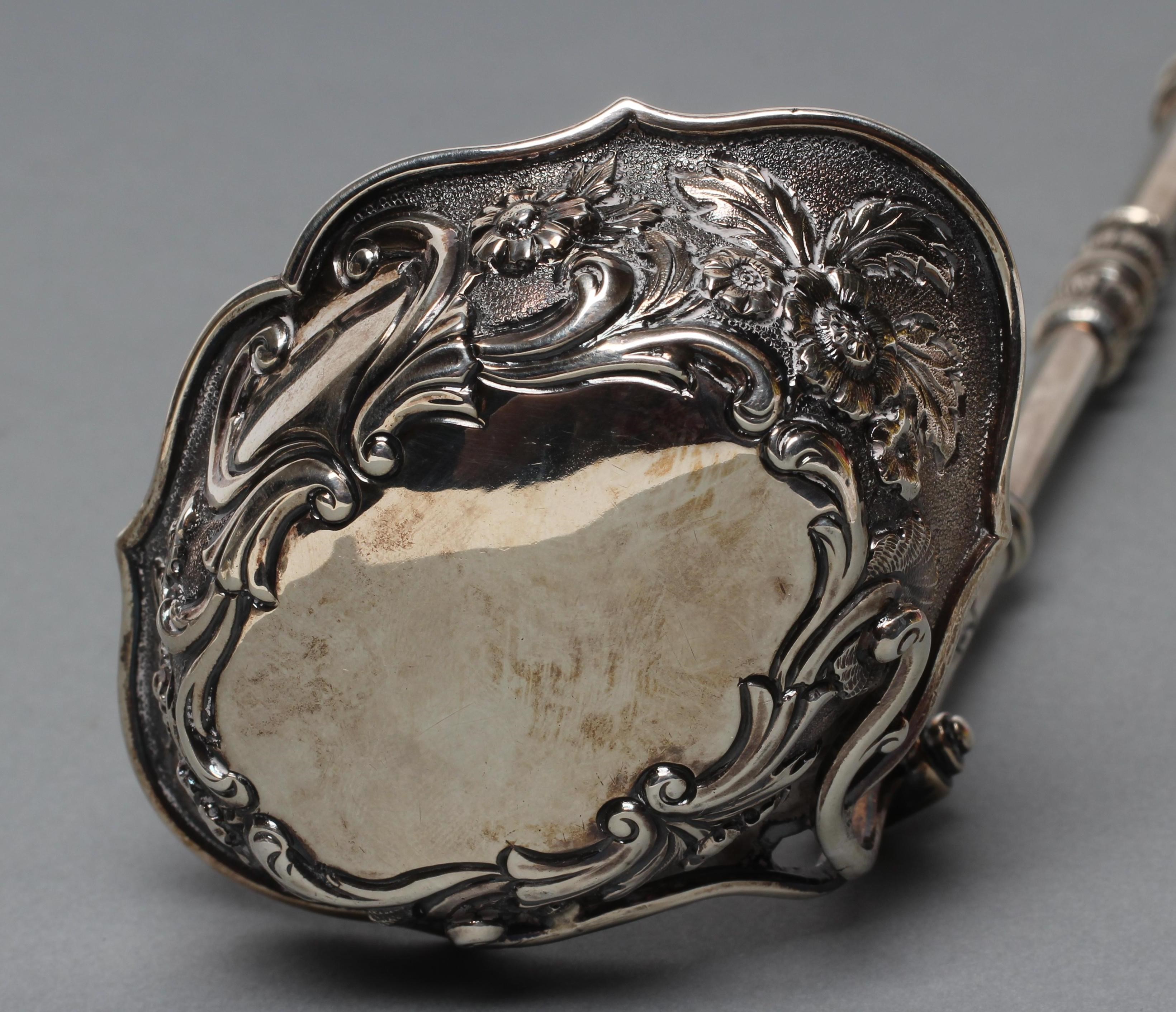 A GEORGE IV SCOTTISH SILVER PUNCH LADLE Image