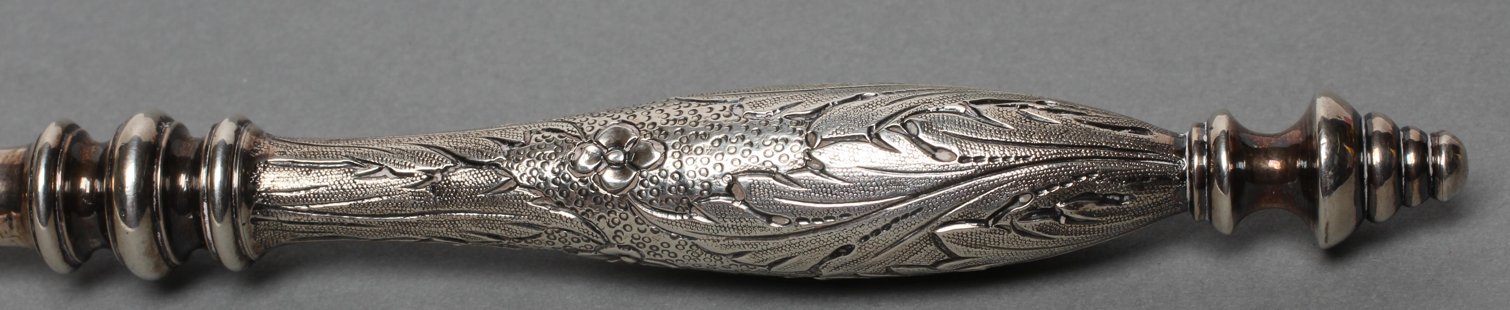 A GEORGE IV SCOTTISH SILVER PUNCH LADLE Image