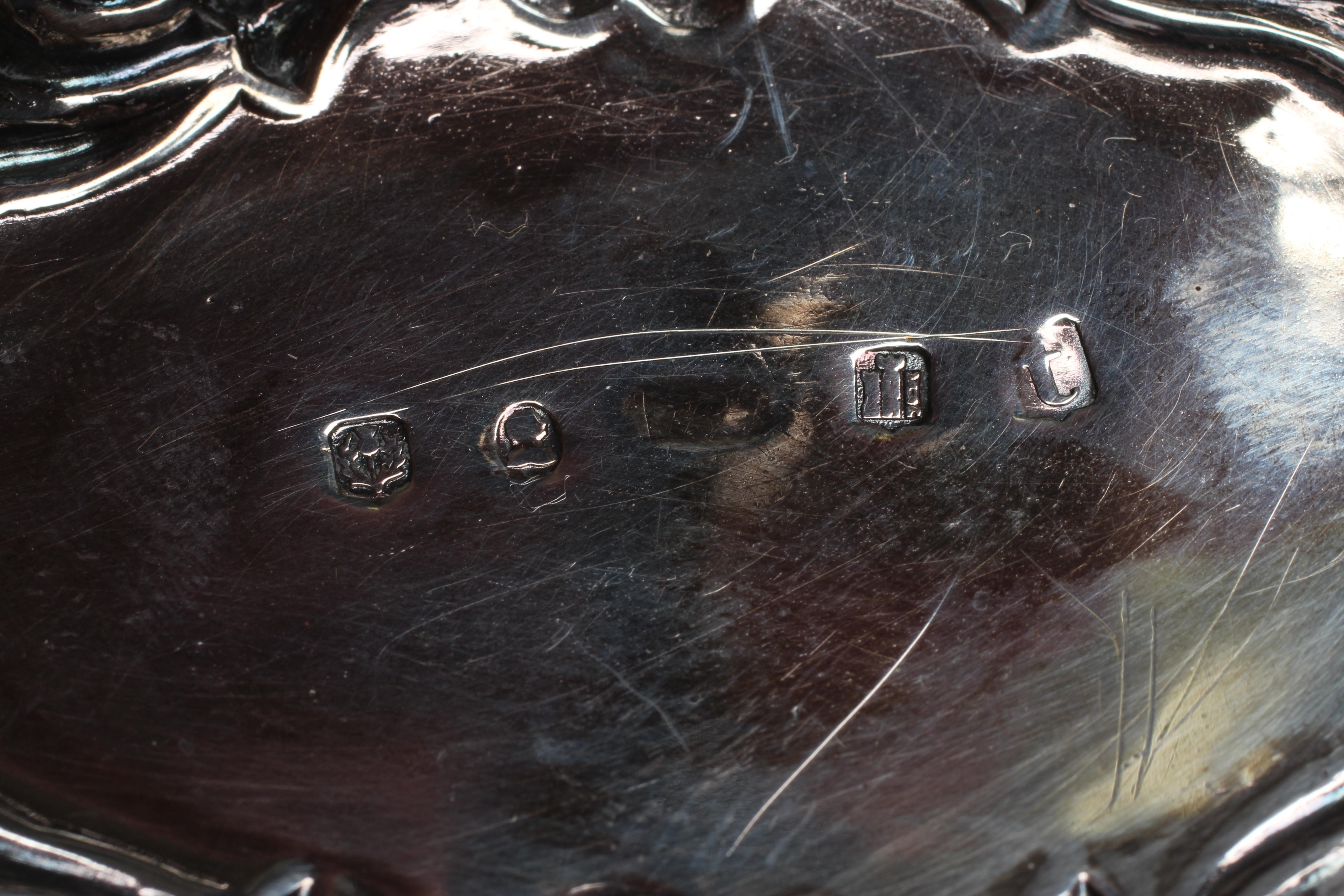 A GEORGE IV SCOTTISH SILVER PUNCH LADLE Image