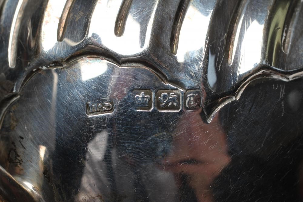 A LATE VICTORIAN SILVER FOUR PIECE TEA SERVICE Image