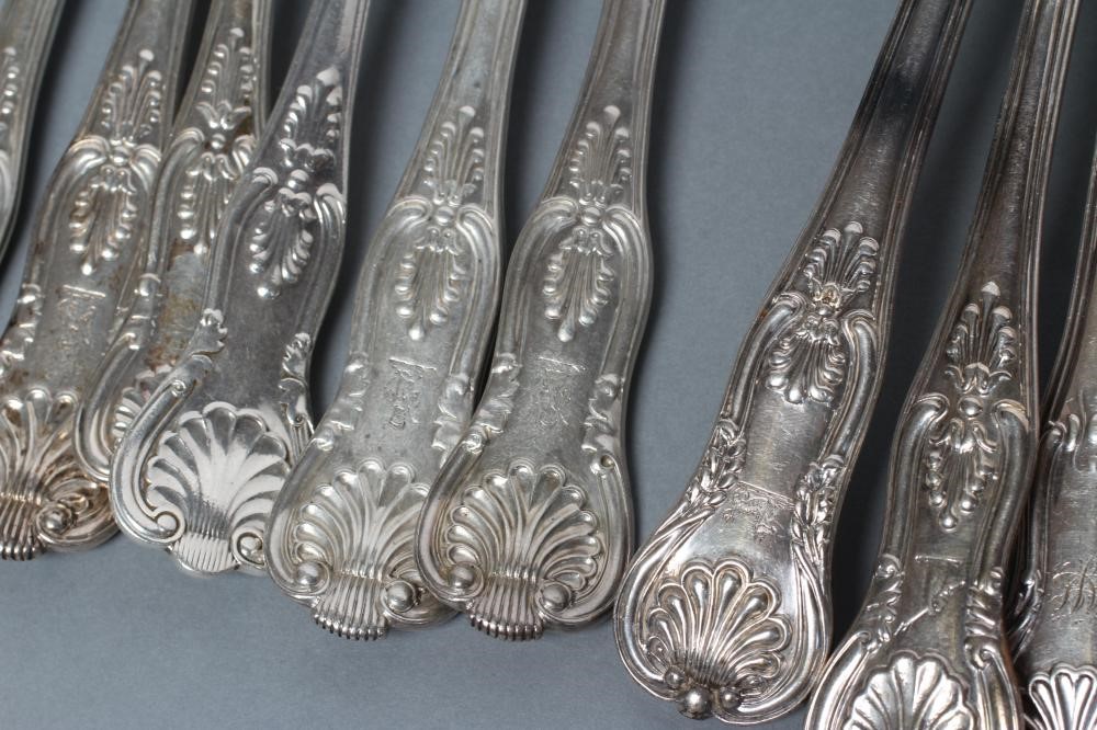 A MATCHED AND COMPOSITE GEORGE III AND LATER SILVER KING'S PATTERN PART TABLE SERVICE comprising six Image