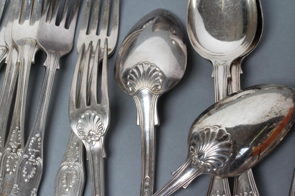 A MATCHED AND COMPOSITE GEORGE III AND LATER SILVER KING'S PATTERN PART TABLE SERVICE comprising six Image