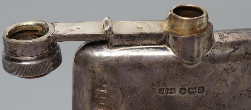 A LATE VICTORIAN SILVER HIP FLASK Image