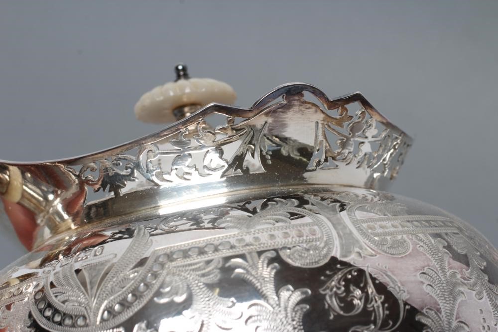 A LATE VICTORIAN SILVER THREE PIECE TEA SERVICE Image