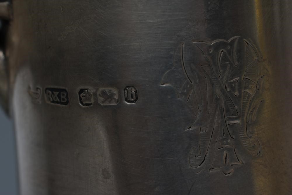 A LATE VICTORIAN SILVER MOUNTED GLASS CLARET JUG Image