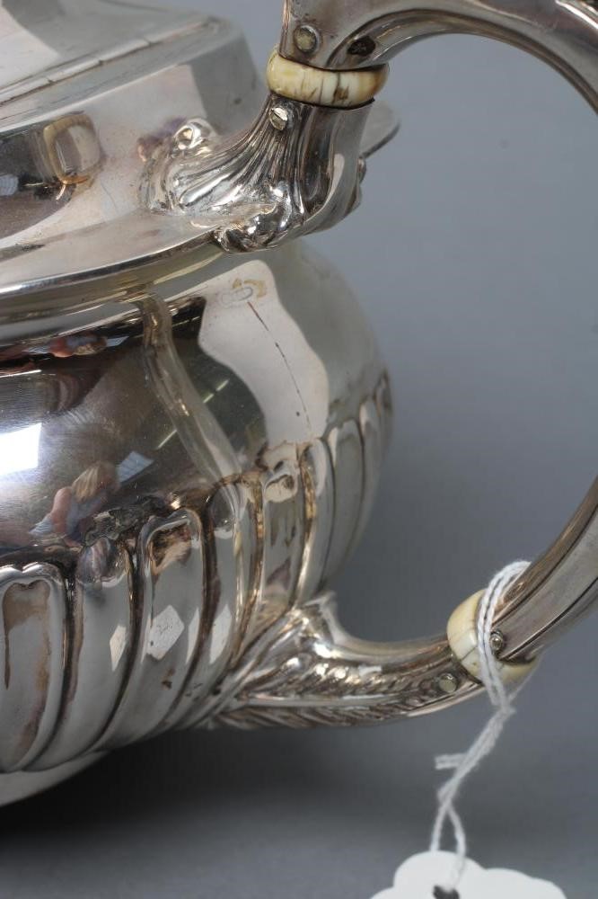 A LATE VICTORIAN SILVER THREE PIECE TEA SERVICE Image