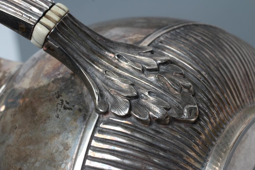 A MID VICTORIAN SILVER THREE PIECE TEA SERVICE Image