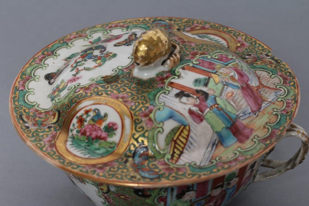 A CANTONESE PORCELAIN ECUELLE AND COVER of circular form with two entwined handles Image