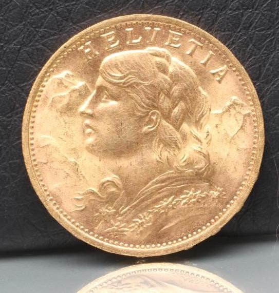A SWISS GOLD 20F COIN Image