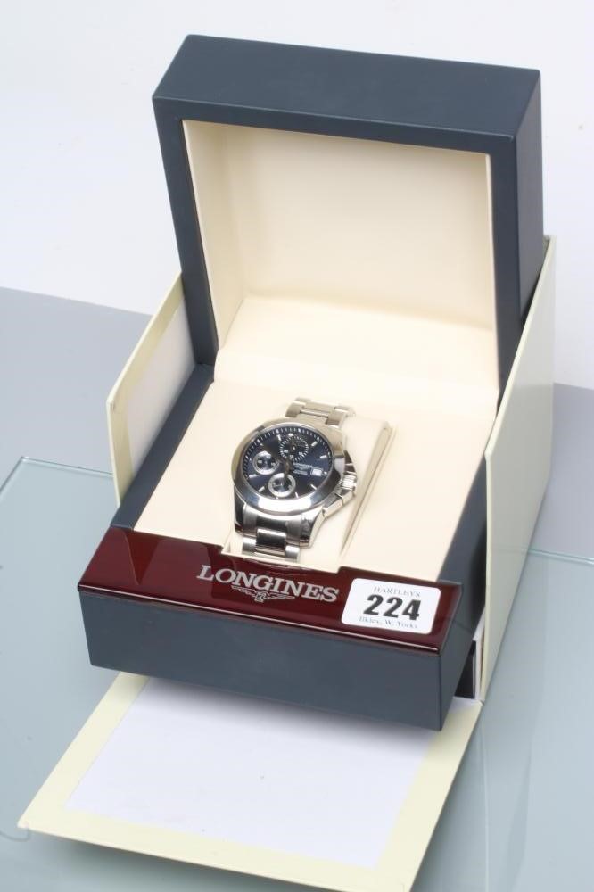 A GENTLEMAN'S LONGINES AUTOMATIC WRISTWATCH Image