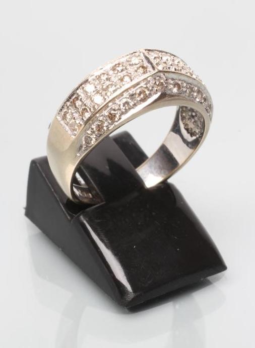 A DIAMOND HALF HOOP RING Image